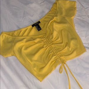 a size small, cropped yellow top
